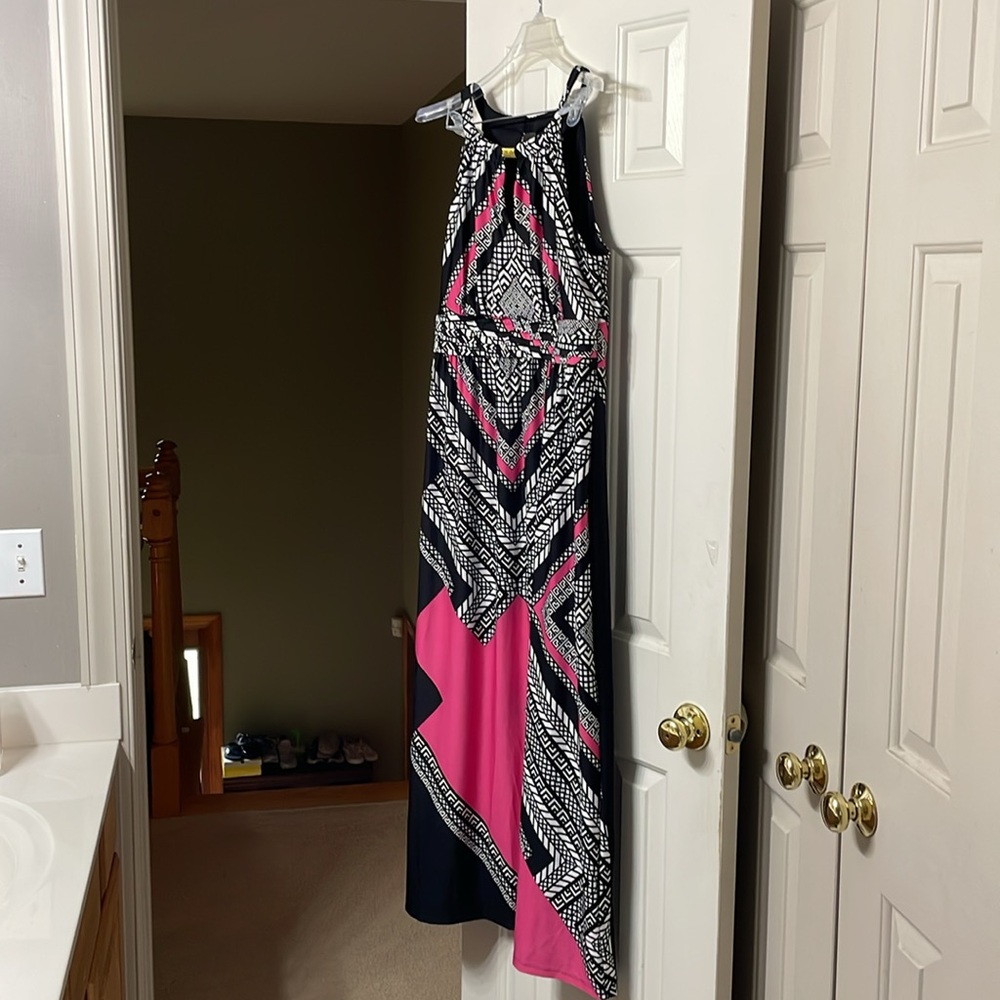 Printed woman maxi dress with open slit to the back and front of top